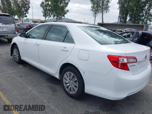 2014 Toyota Camry L with VIN 4T1BF1FK4EU403013, listed as a IAAI auction lot 42115089 with 221,686 mi miles and . Bid and sale history available at DreamBid. Image 3.
