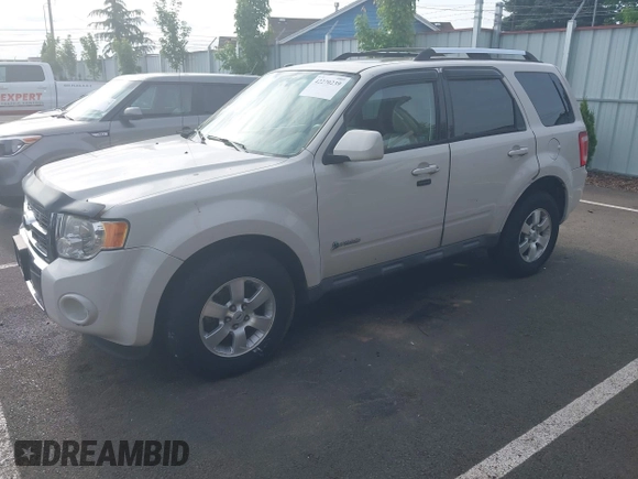 2009 Ford Escape Hybrid with VIN 1FMCU593X9KB70360, listed as a IAAI auction lot 42270239 with 133,658 mi miles and . Bid and sale history available at DreamBid. Image 2.