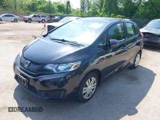 2015 Honda Fit LX z VIN 3HGGK5H51FM724566, wystawiony jako IAAI lot #42151755 z przebiegiem 168 744 mil mil oraz . Historia ofert i sprzedaży dostępna na DreamBid. Obrazek 19.