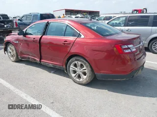2014 Ford Taurus SEL z VIN 1FAHP2E82EG157445, wystawiony jako IAAI lot #42133676 z przebiegiem 174 616 mil mil oraz . Historia ofert i sprzedaży dostępna na DreamBid. Obrazek 3.