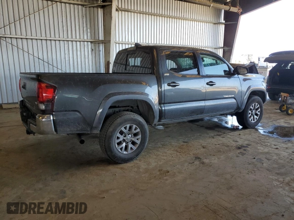 2018 Toyota Tacoma SR5 with VIN 3TMAZ5CN9JM075289, listed as a Copart auction lot 52409365 with 65,793 mi miles and Salvage Title. Bid and sale history available at DreamBid. Image 3.