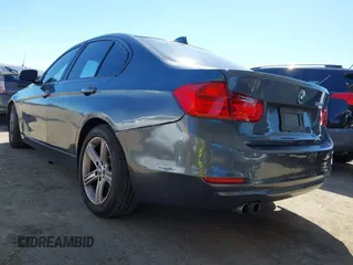 2015 BMW 3 Series 328i with VIN WBA3C1C51FK123852, listed as a IAAI auction lot 41857179 with 90,308 mi miles and . Bid and sale history available at carsss.com. Image 3.