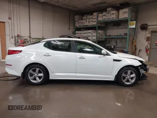 2015 Kia Optima LX with VIN 5XXGM4A7XFG375049, listed as a IAAI auction lot 42198632 with 191,361 mi miles and . Bid and sale history available at DreamBid. Image 14.