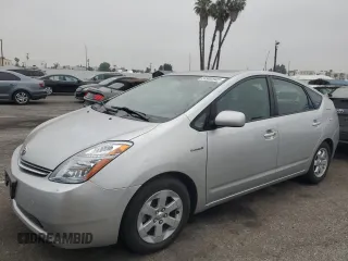 2007 Toyota Prius z VIN JTDKB20U677615705, wystawiony jako Copart lot #54980945 z przebiegiem 233 770 mil mil oraz Czysty tytuł • Clean title. Historia ofert i sprzedaży dostępna na DreamBid. Obrazek 1.