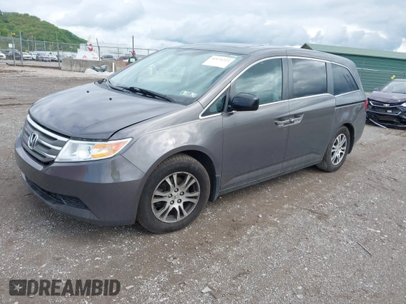 2012 Honda Odyssey EX-L with VIN 5FNRL5H68CB060487, listed as a IAAI auction lot 42176223 with 234,078 mi miles and . Bid and sale history available at DreamBid. Image 2.