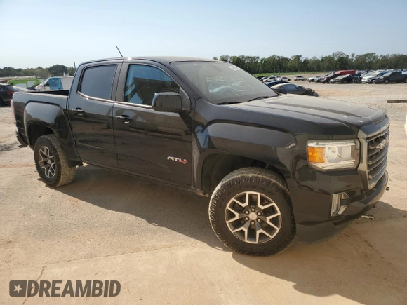 2021 GMC Canyon 4WD AT4 w/Cloth with VIN 1GTG6FEN1M1295551, listed as a Copart auction lot 74900294 with 39,853 mi miles and Salvage Title. Bid and sale history available at carsss.com. Image 4.