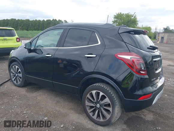 2017 Buick Encore Essence with VIN KL4CJCSB5HB112457, listed as a IAAI auction lot 42180602 with 125,238 mi miles and . Bid and sale history available at carsss.com. Image 3.