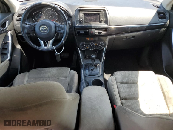 2014 Mazda CX-5 Touring with VIN JM3KE2CY9E0305244, listed as a Copart auction lot 56205605 with 164,516 mi miles and Salvage Title. Bid and sale history available at DreamBid. Image 8.
