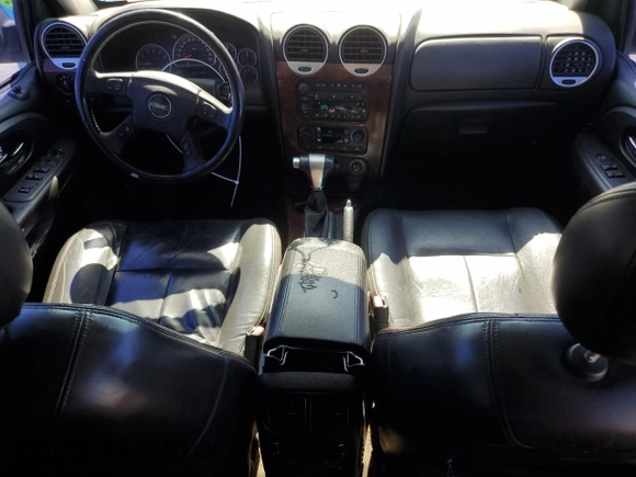 2006 GMC Envoy SLE z VIN 1GKDT13S262210046, wystawiony jako Copart lot #49335595 z przebiegiem 292 940 mil mil oraz Szkoda całkowita • Salvage title. Historia ofert i sprzedaży dostępna na DreamBid. Obrazek 8.