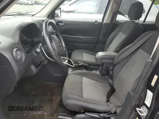 2014 Jeep Patriot Latitude with VIN 1C4NJRFB4ED588422, listed as a Copart auction lot 61401025 with 162,855 mi miles and Salvage title. Bid and sale history available at DreamBid. Image 7.