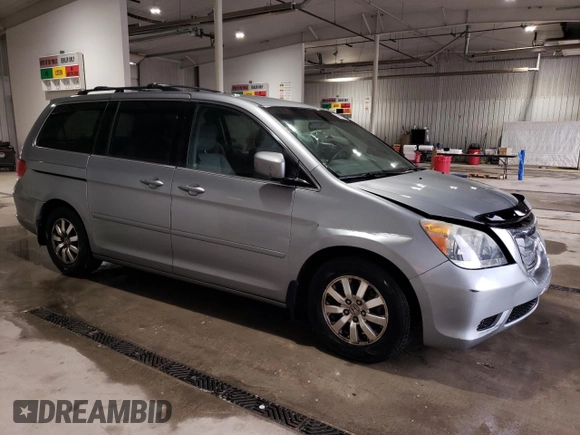 2010 Honda Odyssey EX with VIN 5FNRL3H42AB045192, listed as a Copart auction lot 55817925 with 133,712 mi miles and Salvage Title. Bid and sale history available at DreamBid. Image 4.