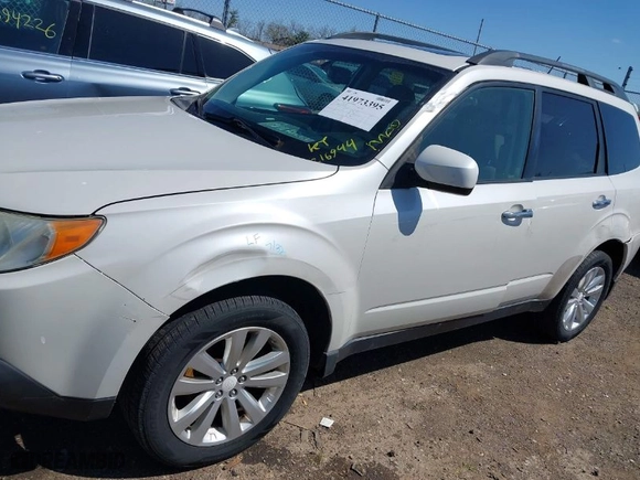 2011 Subaru Forester 2.5X Limited with VIN JF2SHBEC7BH778799, listed as a IAAI auction lot 41973395 with 216,944 mi miles. Bid and sale history available at carsss.com. Image 6.