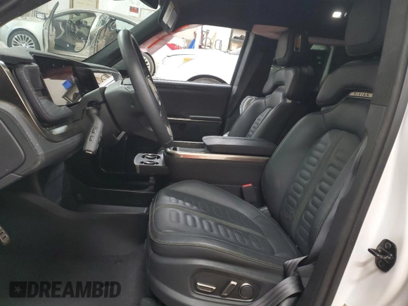 2023 Rivian R1S Adventure z VIN 7PDSGABA2PN013659, wystawiony jako Copart lot #53475945 z przebiegiem 13 928 mil mil oraz Szkody całkowita. Historia ofert i sprzedaży dostępna na DreamBid. Obrazek 7.