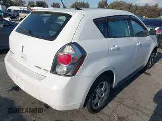 2009 Pontiac Vibe with VIN 5Y2SM67059Z401610, listed as a IAAI auction lot 42150702 with 225,835 mi miles. Bid and sale history available at carsss.com. Image 4.