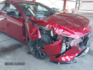 2021 Mazda 3 Premium Plus z VIN JM1BPBNY3M1332643, wystawiony jako IAAI lot #41536777 z przebiegiem 43 075 mil mil oraz . Historia ofert i sprzedaży dostępna na DreamBid. Obrazek 6.