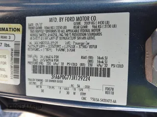 2018 Ford Fusion S with VIN 3FA6P0G77JR129224, listed as a IAAI auction lot 41483648 with 104,045 mi miles. Bid and sale history available at carsss.com. Image 9.
