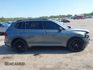 2020 Volkswagen Tiguan SE with VIN 3VV3B7AX3LM176300, listed as a IAAI auction lot 42004744 with 86,074 mi miles and . Bid and sale history available at DreamBid. Image 13.