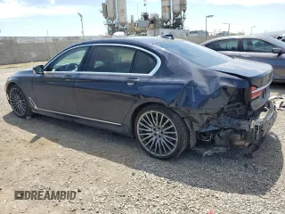 2018 BMW 7 Series 740i with VIN WBA7E2C58JG743126, listed as a Copart auction lot 53843795 with 90,614 mi miles and Salvage title. Bid and sale history available at DreamBid. Image 2.