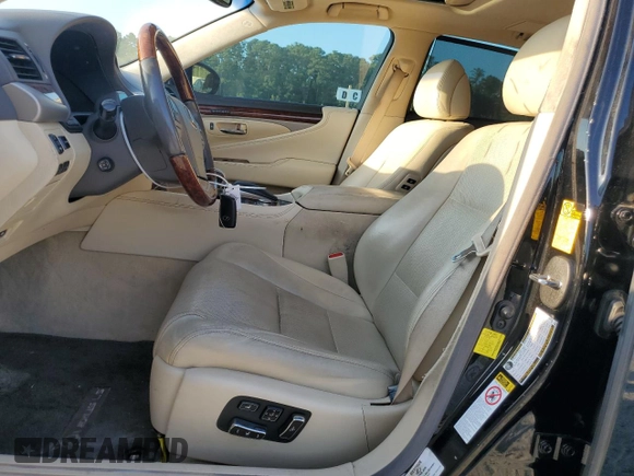 2015 Lexus LS 460 L with VIN JTHGL1EF9F5053850, listed as a Copart auction lot 69187144 with 111,791 mi miles and Salvage title. Bid and sale history available at DreamBid. Image 7.