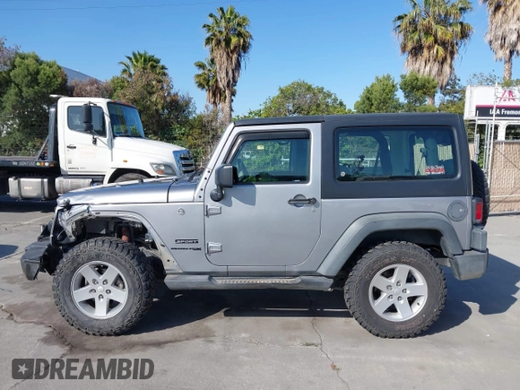2018 Jeep Wrangler Sport S with VIN 1C4GJWAG9JL931235, listed as a IAAI auction lot 42417596 with 93,635 mi miles and . Bid and sale history available at DreamBid. Image 14.
