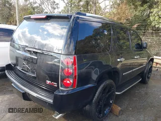 2011 GMC Yukon Denali with VIN 1GKS2EEF6BR257194, listed as a IAAI auction lot 41619864 with 183,057 mi miles. Bid and sale history available at carsss.com. Image 4.