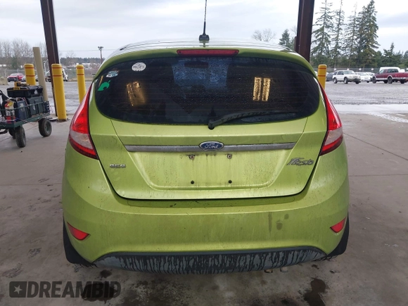 2011 Ford Fiesta SES with VIN 3FADP4FJ7BM127600, listed as a IAAI auction lot 41657170 with 135,483 mi miles. Bid and sale history available at carsss.com. Image 17.