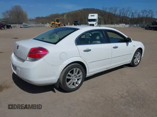 2009 Saturn Aura XR with VIN 1G8ZV57B09F163717, listed as a IAAI auction lot 42053373 with 145,252 mi miles and . Bid and sale history available at DreamBid. Image 4.