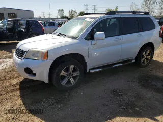 2011 Mitsubishi Endeavor z VIN 4A4JM3ASXBE021026, wystawiony jako Copart lot #74009064 z przebiegiem 161 160 mil mil oraz Szkoda całkowita • Salvage title. Historia ofert i sprzedaży dostępna na DreamBid. Obrazek 1.