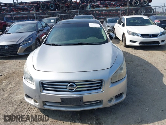 2014 Nissan Maxima S z VIN 1N4AA5AP6EC910967, wystawiony jako IAAI lot #42124722 z przebiegiem 111 986 mil mil oraz . Historia ofert i sprzedaży dostępna na DreamBid. Obrazek 12.
