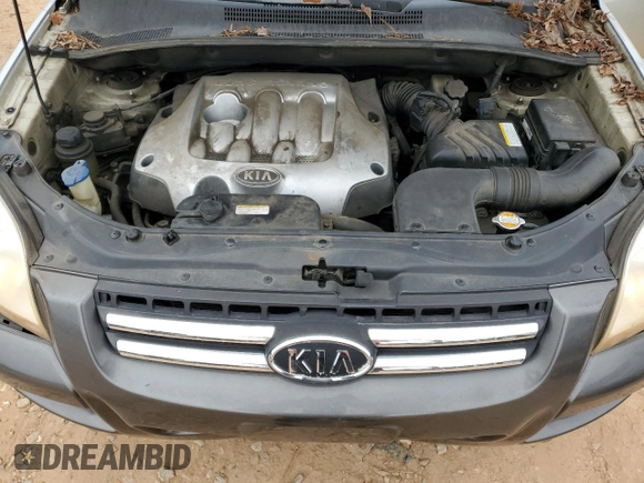 2006 Kia Sportage LX z VIN KNDJF724467145179, wystawiony jako Copart lot #41755105 z przebiegiem 250 252 mil mil oraz Szkoda całkowita • Salvage title. Historia ofert i sprzedaży dostępna na DreamBid. Obrazek 14.