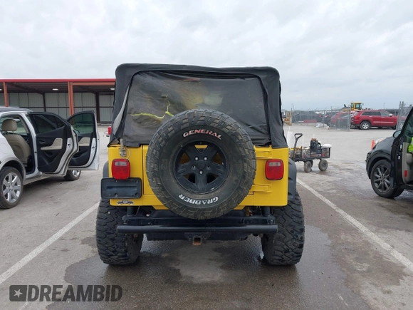2000 Jeep Wrangler SE with VIN 1J4FA29P5YP705215, listed as a IAAI auction lot 41920532 with 92,927 mi miles and . Bid and sale history available at DreamBid. Image 17.