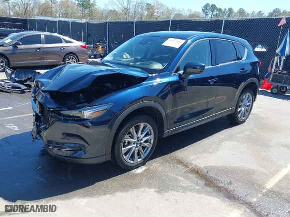 2021 Mazda CX-5 Grand Touring with VIN JM3KFBDM8M1426932, listed as a IAAI auction lot 41847448 with 17,933 mi miles. Bid and sale history available at carsss.com. Image 17.