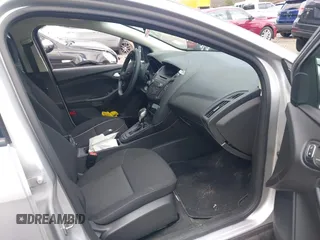 2017 Ford Focus SE with VIN 1FADP3F25HL335102, listed as a IAAI auction lot 42010697 with 77,389 mi miles. Bid and sale history available at carsss.com. Image 5.
