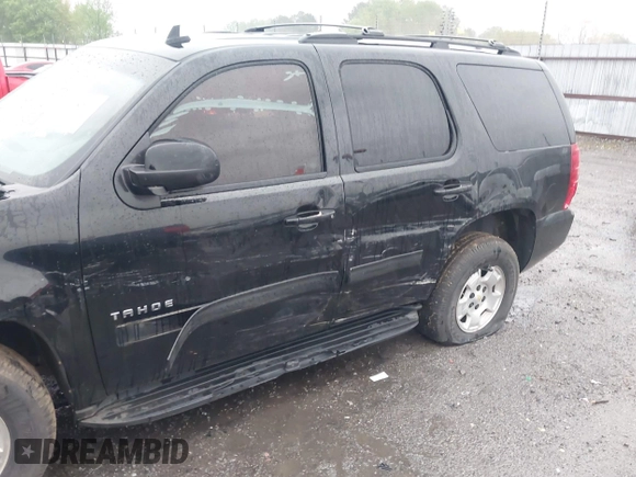 2013 Chevrolet Tahoe LS with VIN 1GNSCAE07DR223062, listed as a IAAI auction lot 41948276 with 196,616 mi miles and . Bid and sale history available at DreamBid. Image 6.