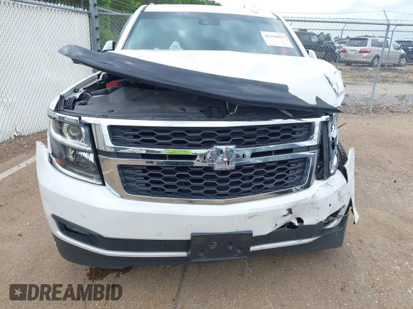 2020 Chevrolet Tahoe LT with VIN 1GNSCBKC4LR181887, listed as a IAAI auction lot 42160821 with 106,757 mi miles and . Bid and sale history available at DreamBid. Image 18.