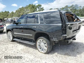 2016 Cadillac Escalade Platinum z VIN 1GYS4DKJ0GR165640, wystawiony jako Copart lot #52453805 z przebiegiem 103 086 mil mil oraz Szkoda całkowita • Salvage title. Historia ofert i sprzedaży dostępna na DreamBid. Obrazek 2.