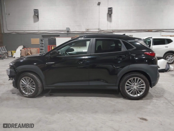 2019 Hyundai Kona SEL with VIN KM8K6CAA4KU382976, listed as a IAAI auction lot 41820749 with 61,619 mi miles. Bid and sale history available at carsss.com. Image 14.