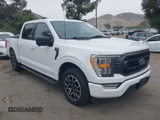 2021 Ford F-150 XL with VIN 1FTEW1CP7MKE89476, listed as a IAAI auction lot 42299954 with 152,473 mi miles and . Bid and sale history available at DreamBid. Image 1.