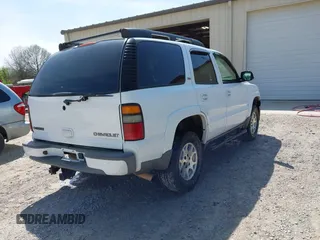 2004 Chevrolet Tahoe Z71 z VIN 1GNEK13ZX4R269230, wystawiony jako IAAI lot #41780307 z przebiegiem 249 453 mil mil oraz . Historia ofert i sprzedaży dostępna na DreamBid. Obrazek 4.