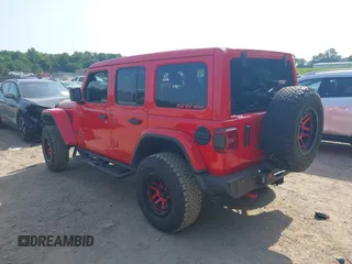 2022 Jeep Wrangler Unlimited Rubicon with VIN 1C4HJXFG0NW100620, listed as a IAAI auction lot 42534993 with 21,614 mi miles and . Bid and sale history available at DreamBid. Image 3.
