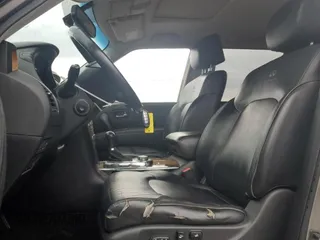 2012 Infiniti QX56 7-passenger with VIN JN8AZ2NE2C9021981, listed as a Copart auction lot 78465744 with 195,422 mi miles and Salvage Title. Bid and sale history available at carsss.com. Image 7.
