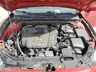 2014 Mazda 3 i Touring z VIN JM1BM1V7XE1141815, wystawiony jako Copart lot #54198135 z przebiegiem 53 478 mil mil oraz Szkoda całkowita • Salvage title. Historia ofert i sprzedaży dostępna na DreamBid. Obrazek 11.