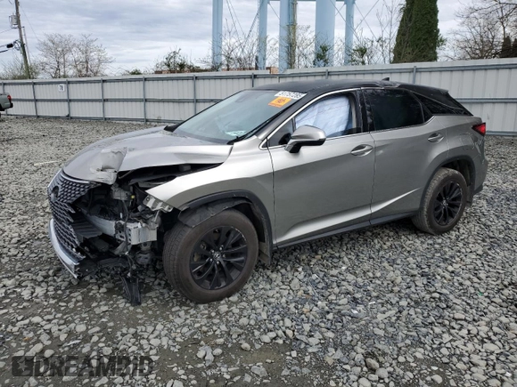 2021 Lexus RX 350 with VIN 2T2AZMDA0MC301668, listed as a Copart auction lot 51757285 with 221,210 mi miles and Salvage title. Bid and sale history available at DreamBid. Image 1.