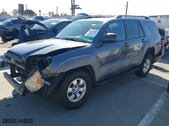 2003 Toyota 4Runner SR5 with VIN JTEZU14R238001341, listed as a IAAI auction lot 41670928 with 212,723 mi miles. Bid and sale history available at carsss.com. Image 2.