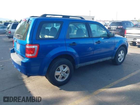 2011 Ford Escape XLS with VIN 1FMCU0C78BKC16059, listed as a IAAI auction lot 42577234 with 210,890 mi miles and . Bid and sale history available at DreamBid. Image 4.