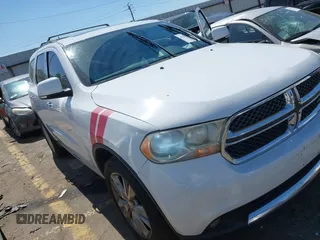 2013 Dodge Durango Crew with VIN 1C4RDHDG8DC698668, listed as a IAAI auction lot 41876841 with 160,012 mi miles and . Bid and sale history available at DreamBid. Image 1.