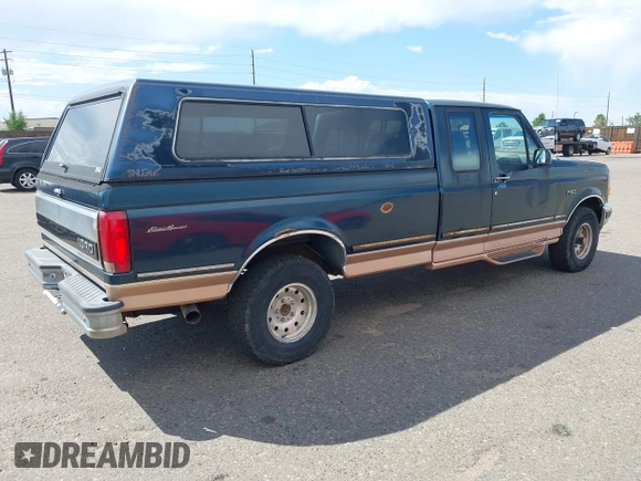 1995 Ford F-150 z VIN 1FTEX14H3SKA80389, wystawiony jako IAAI lot #42686705 z przebiegiem 192 784 mil mil oraz . Historia ofert i sprzedaży dostępna na DreamBid. Obrazek 4.
