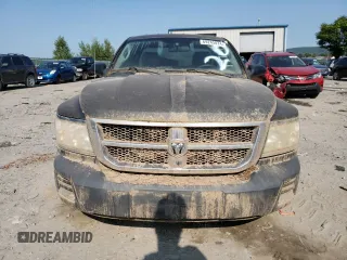 2008 Dodge Dakota z VIN 1D7HW32K58S571930, wystawiony jako Copart lot #69245074 z przebiegiem Nie podano mil oraz Szkoda całkowita • Salvage title. Historia ofert i sprzedaży dostępna na DreamBid. Obrazek 5.