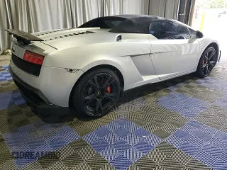 2013 Lamborghini Gallardo z VIN ZHWGU6BZ7DLA12811, wystawiony jako Copart lot #51696395 z przebiegiem 35 389 mil mil oraz Szkody całkowita. Historia ofert i sprzedaży dostępna na DreamBid. Obrazek 3.