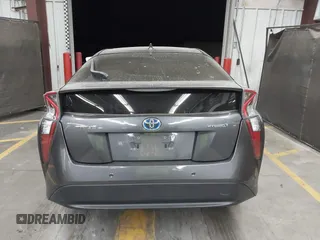 2018 Toyota Prius Two with VIN JTDKARFU6J3553871, listed as a IAAI auction lot 41577636 with 118,715 mi miles. Bid and sale history available at carsss.com. Image 16.